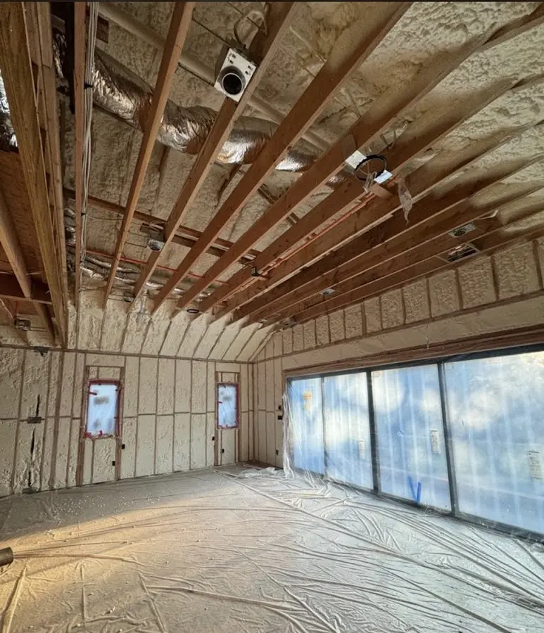Interior walls and ceiling insulated with spray foam during new construction in Murphysboro